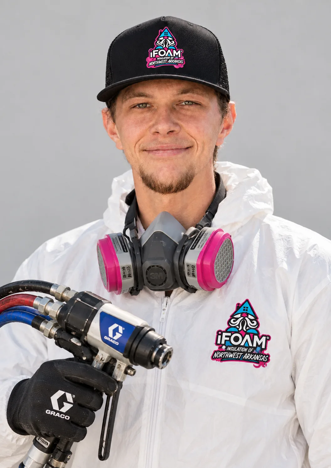 An iFOAM of Northwest Arkansas crew lead in branded uniform