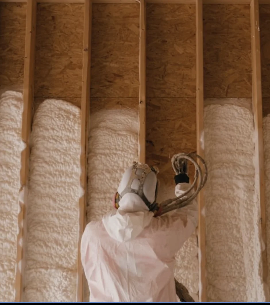 Closed-cell spray foam between wall studs